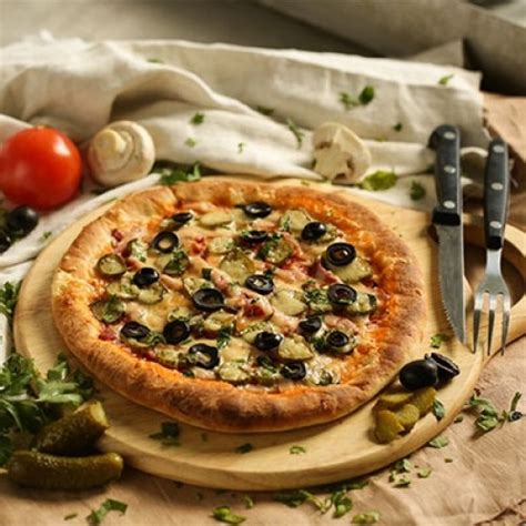 Особенности источника наслаждения - пикантная и аппетитная пицца